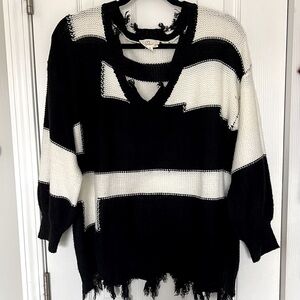 Distressed sweater